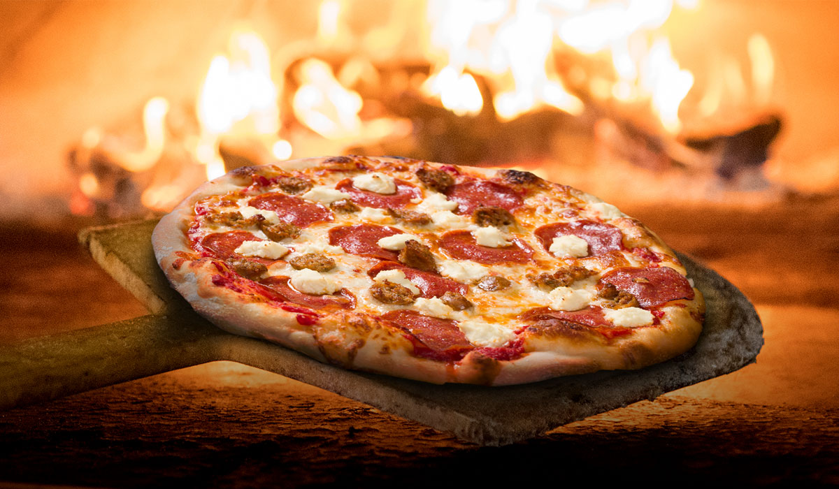 The heart of the pizza: A traditional oven that promises mouthwatering delights.