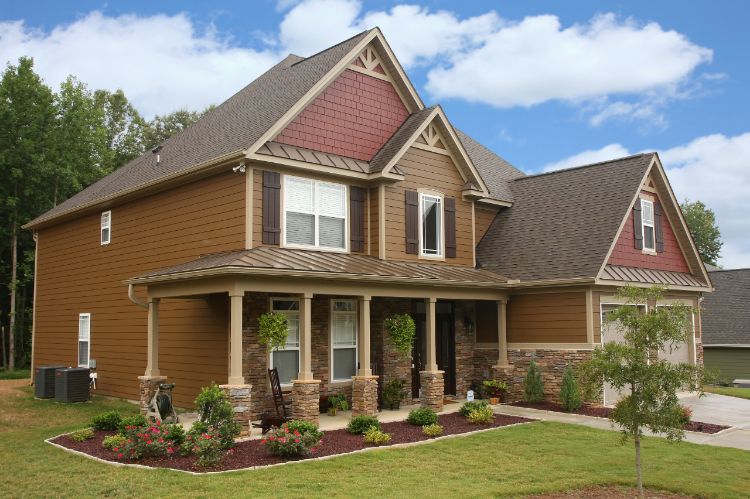 Hardie Board vs. Vinyl Siding: A visual comparison.